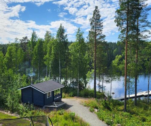 Lomamökki seitsemisen kansallispuiston lähellä