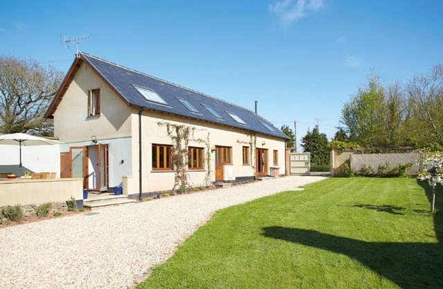 Long Meadow Barn is a charming, spacious detached converted barn set in the village of Down St. Mary