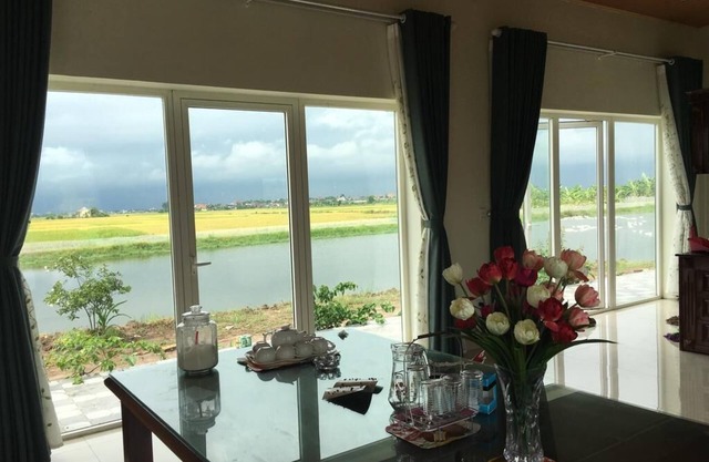 Lotus House with a beautiful rice field view