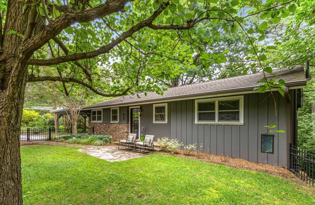 Lovely downtown home with fireplace, 2 enclosed yards, stone patio, washer/dryer