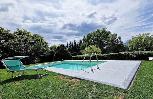 Lovely holiday home at Lake Orta with private garden and pool
