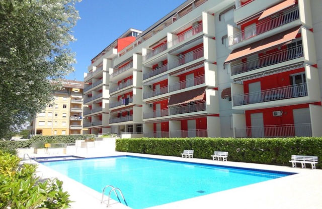 Lovely flat with balcony and shared swimming pool