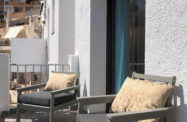 Lovely two bedroom villa. South facing sunny private terrace. Very accessible