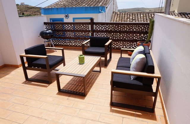 Lovely village house close to many beaches. Large private sunny roof terrace.