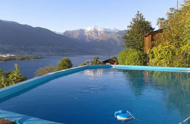 Lovingly furnished studio apartment with a pool and a magnificent panoramic view