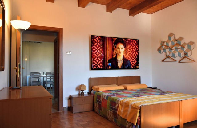 Luce e Fantasia a 3 minuti dalla spiaggia. Con TV 70" e Aria Condizionata!