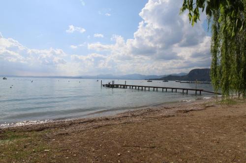 Lussuoso Appartamento vista lago con spiaggia privata