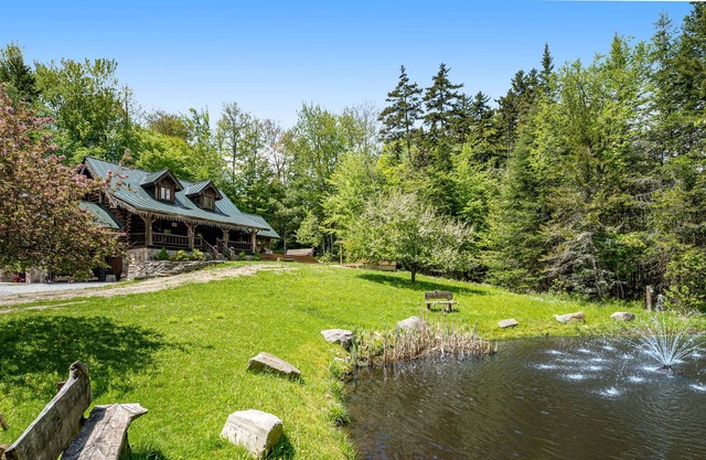 Luxe log home with private hot tub, pool table & outdoor kitchen - dog-friendly