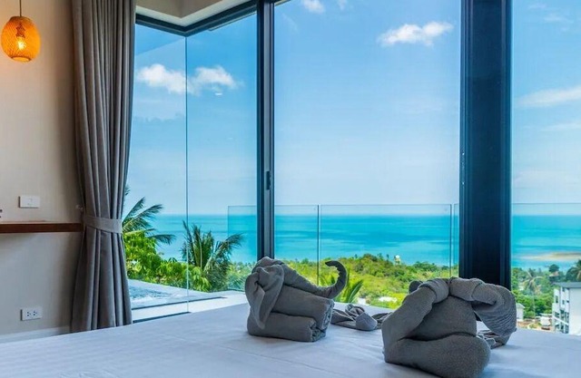 Luxurious 3-bedroom villa in Koh Samui with infinity pool, sea views, and WiFi, near Lamai Beach