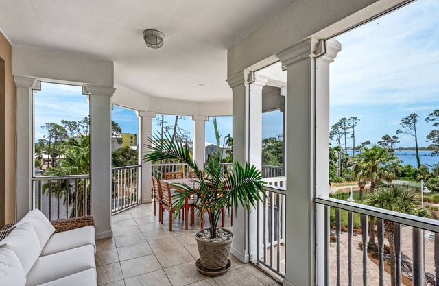 Luxurious bayfront condo in a gated resort with an amazing pool & hot tub