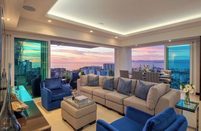 Luxurious condo in the West Coast hills with views of the ocean and city life.