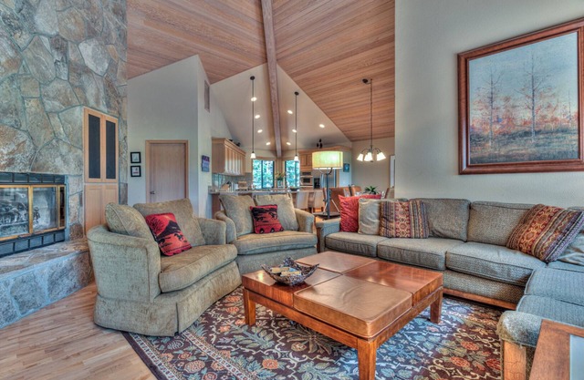Luxurious home on the golf course. Oversized deck, hot tub, covered patio!