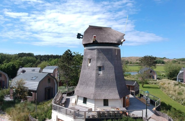 Luxurious holiday mill in a dune park, located in close vicinity of the beach