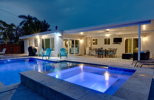 Luxurious private home with heated pool & spa . Five min to beach