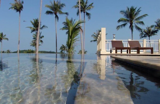 Luxurious semi - detached 2 bedroom Villa with 2 superb pools and sea views