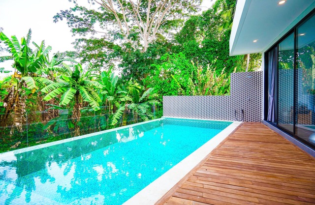 Luxury 3 bedrooms Villa rainforest side at vibrant Tibubenen Canggu