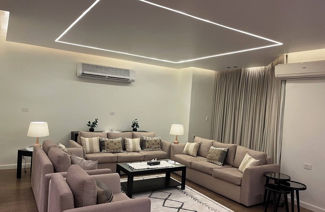 Luxury 3-bedroom apartment in Mohandseen with AC, WiFi