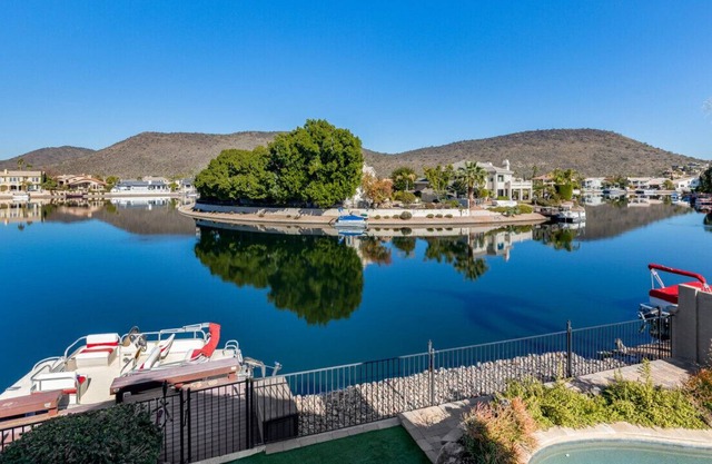 Luxury 4BR Waterfront Home with Pool & Boat