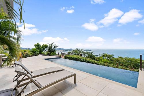 Luxury 5BR Oceanview Villa with Infinity Pool, King Beds, and Sunset Views Over Playa Prieta