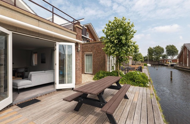 luxury apartment with waterside terrace