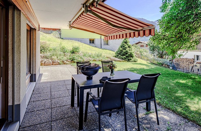 Luxury apartment with private garden terrace in romantic Brienz, near Interlaken
