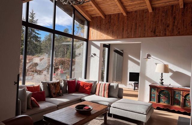 Luxury 5 bedroom, 3 bathroom hillside Chalet with views of Italian border.