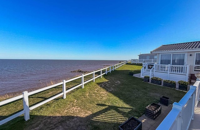 Luxury caravan for hire at Hopton Holiday Park with full sea views ref 80010H