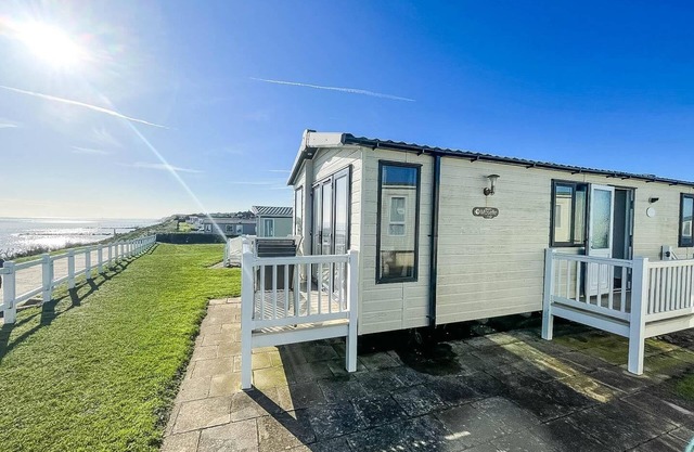 Luxury caravan boasting full sea views at Hopton Holiday Park ref 80041S