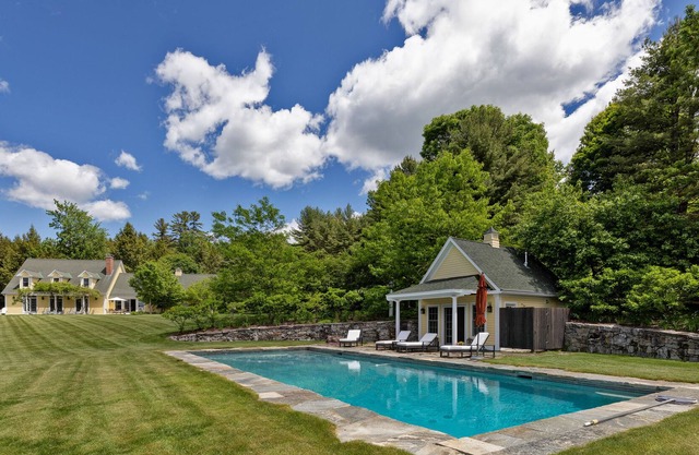Luxury estate on 17 acres with private pool, pond, gym, game room & views