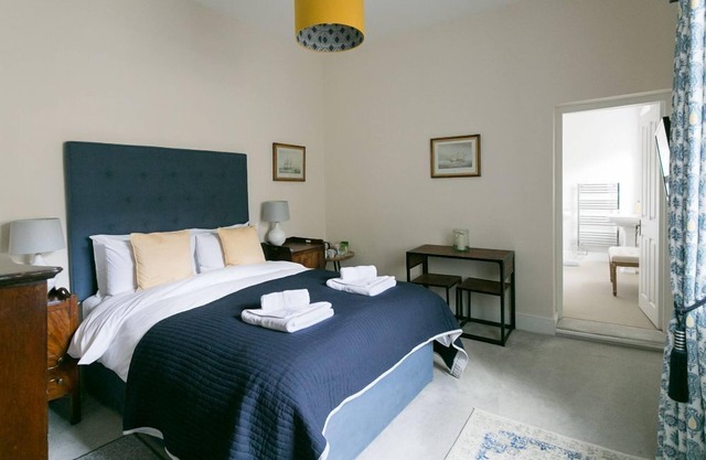 Luxury King bedroom with ensuite bathroom in a wing of a private Country House