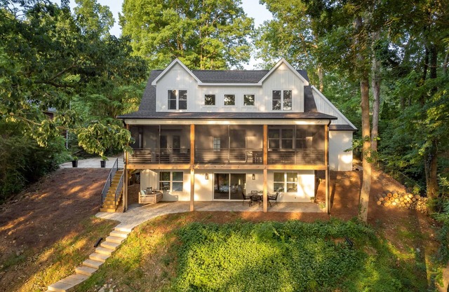 Luxury Lakefront home with gorgeous views, screened patio, firepit, & boat dock