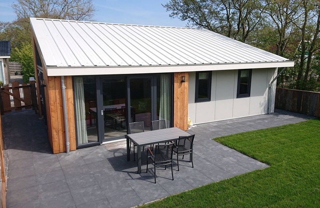 Luxury new detached house near the beach with a large garden and terrace.
