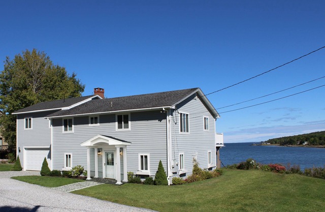 Luxury Oceanfront Home Overlooking Rockland Harbor and Lighthouse