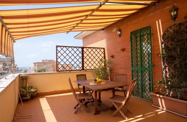 Luxury penthouse overlooking the sea at Lido di Roma.