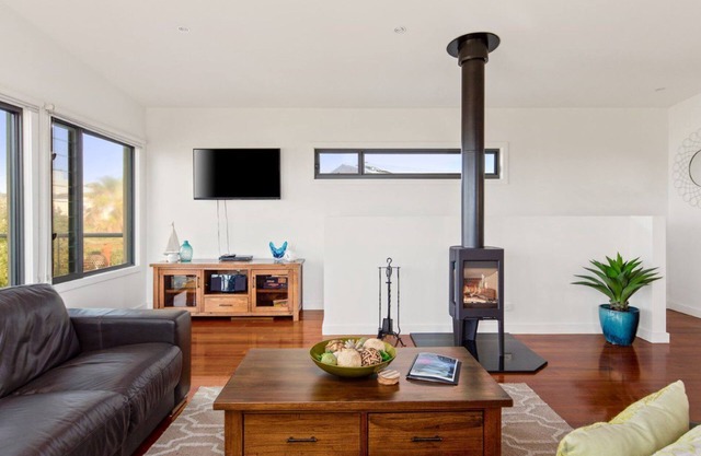 Luxury Retreat at Pristine Surf Beach - with wood fireplace - Only 50m from the beach