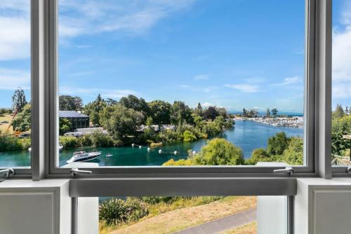 Luxury Riverfront Apartment With Views and Pool Access