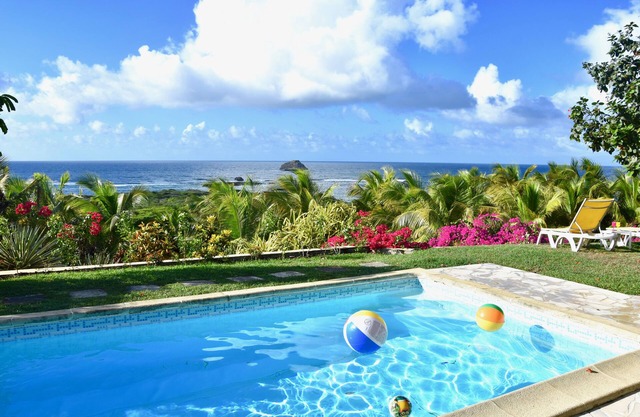Luxury secured villa with pool, view of the coconut trees, the lagoon & the sea