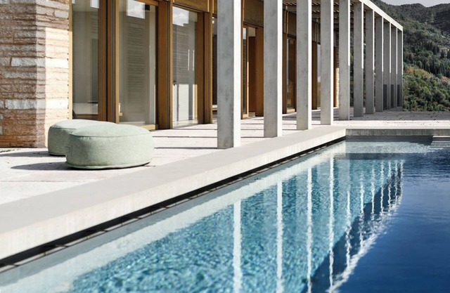 Luxury Villa with infinity pool and lake view from architect David Chipperfield