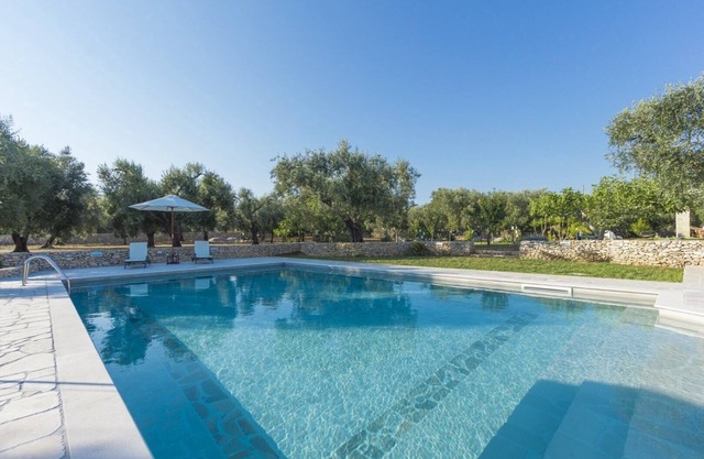 Luxury villa with swimming pool garden outside space in the countryside of Salento