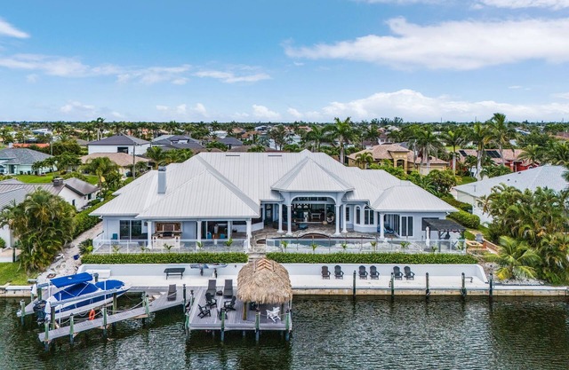 Luxury Waterfront Resort-Style Home in SW Cape Coral. nON-SITE recreation! NEW