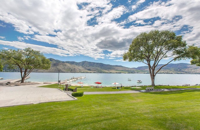 Luxury waterfront townhouse w/sandy beach outside your patio door! WOW!