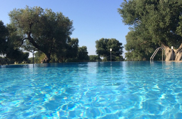Magnificent villa with swimming pool in the centuries-old olive trees of Salento near Ostuni.