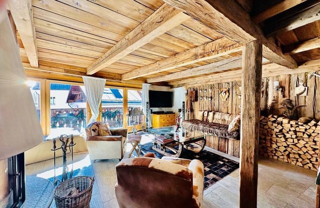Maisonettewohnung im Alpenstil mit 360 Grad Kamin