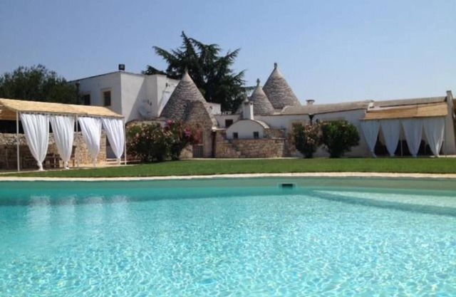 Mansion among the olive trees and horses