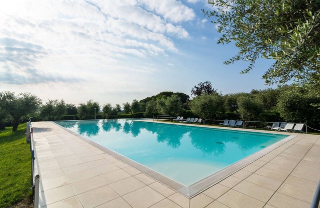 Mansion by Lake Garda with Pools & Olive Trees