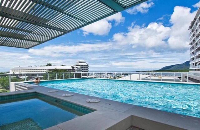 Marlin Parade Waterfront Getaway with Rooftop Pool