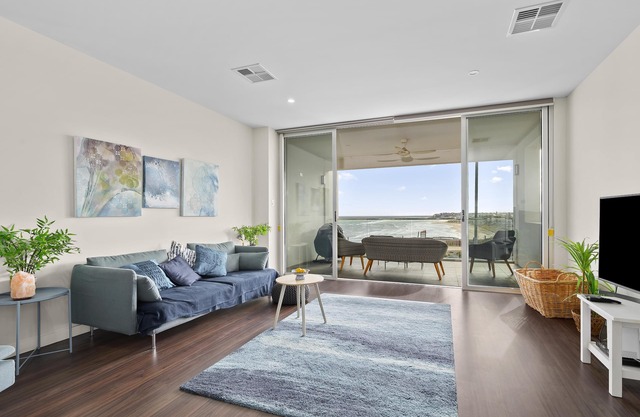 Meander ~ Port Noarlunga South - Perched up high on the red sandstone beach cliffs, your vantage point offers unrivalled views of where the Onkaparinga River meets the sea – just outside your front door.