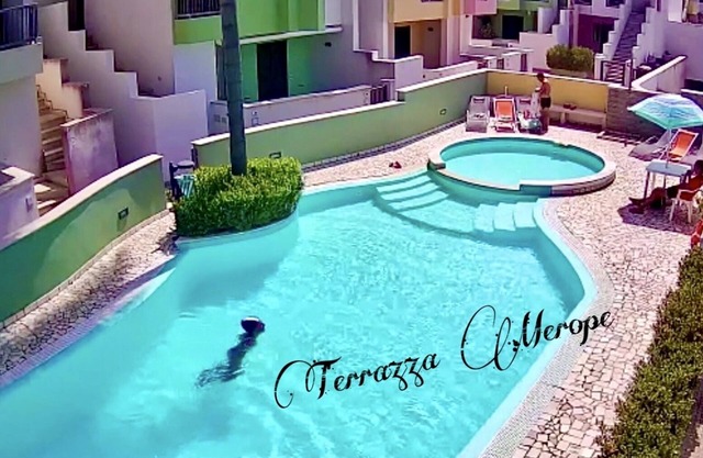 Merope terrace in residence with pool