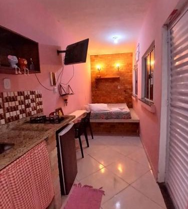 Mini casa pé na areia