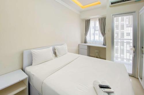 Minimalist and Cozy Studio Transpark Juanda Bekasi Timur Apartment By Travelio